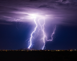 Lightning striking the ground.