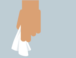  A hand holding a tissue
