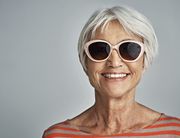 A woman wearing sunglasses.
